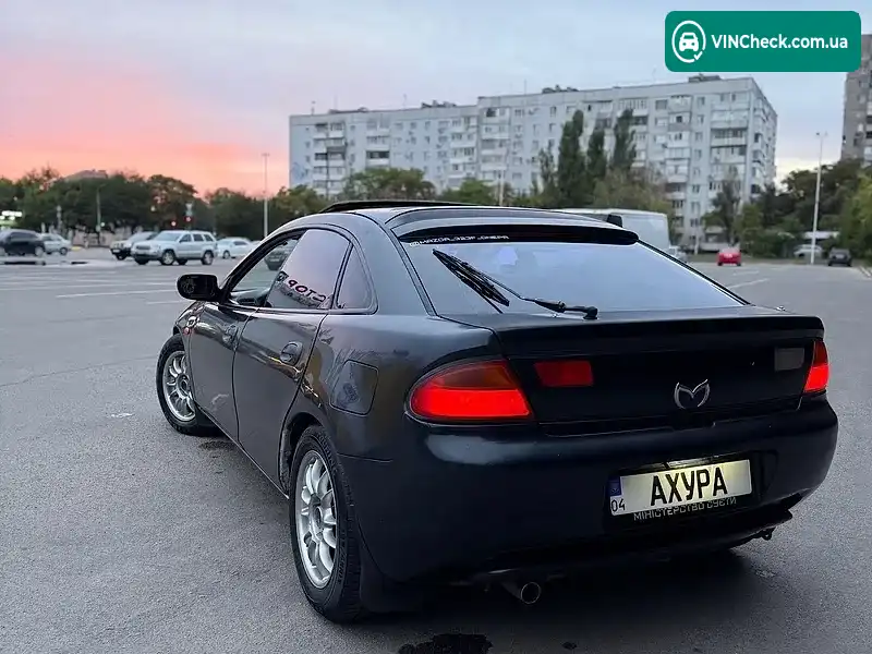 Mazda 323 1998, фото з оголошення 1 з 10, VIN JMZBA145201634476