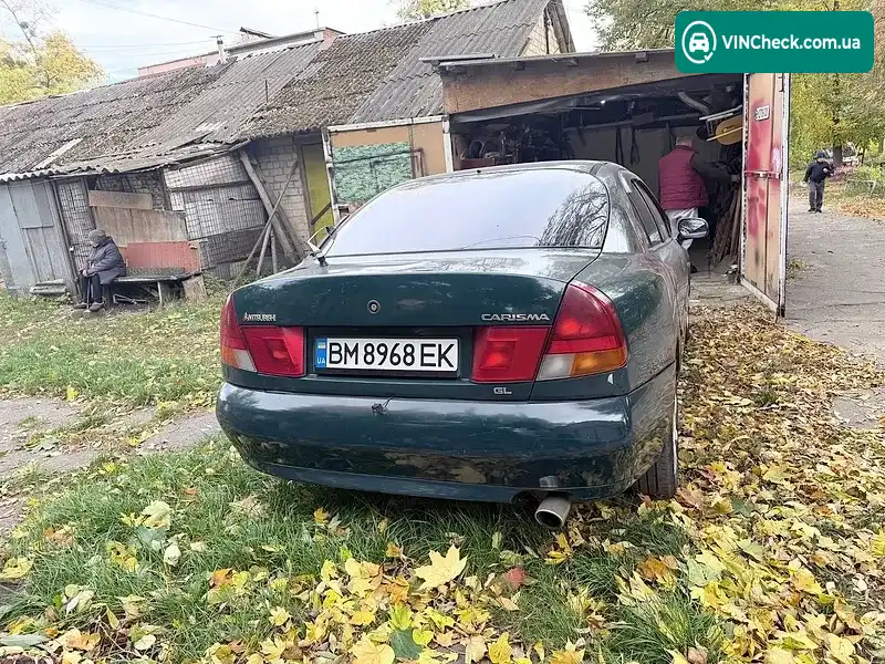 Mitsubishi Carisma 1998, фото з оголошення 2 з 8, VIN XMCLNDA1AWF025932