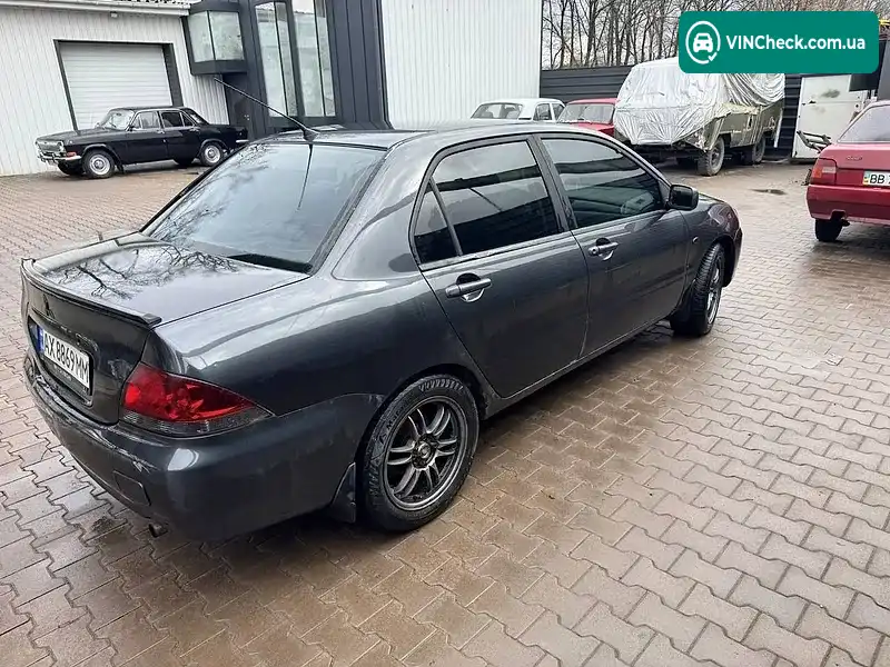 Mitsubishi Lancer 2004, фото з оголошення 2 з 6, VIN JMBSNCS3A4U006799