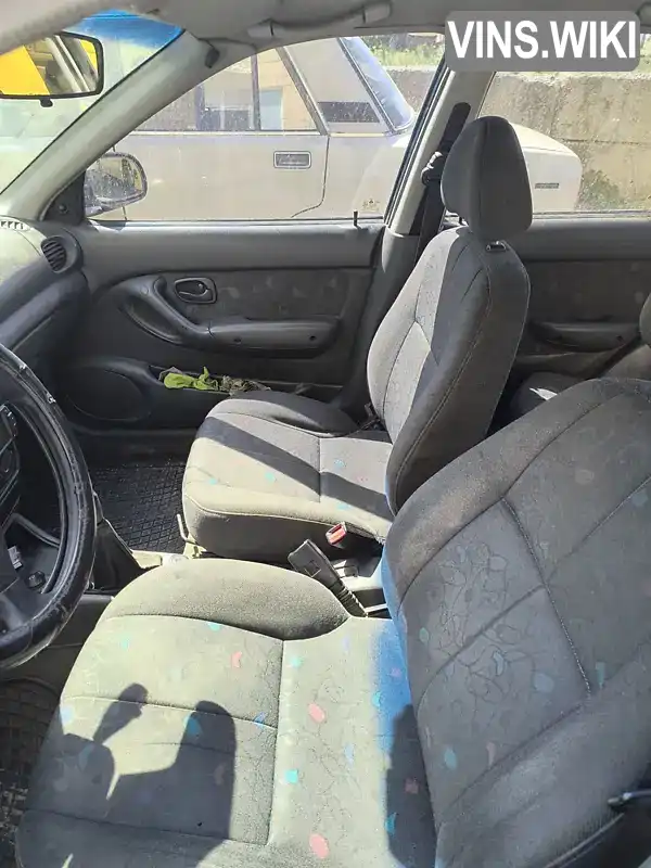 Hyundai Accent 1997, фото з оголошення 2 з 8, VIN KMHVF31NPVU387036