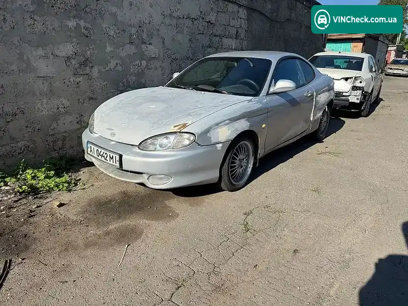 Hyundai Coupe 1998, фото з оголошення 1 з 4, VIN KMHJG21RPWU075046
