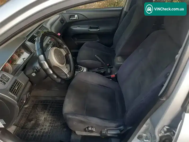 Mitsubishi Lancer 2003, фото з оголошення 2 з 20, VIN JMBLNCS3W4U002710