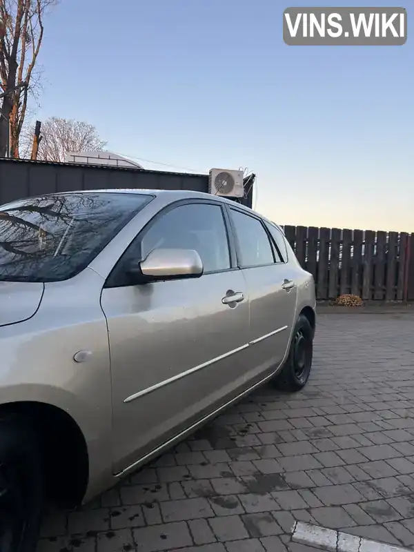 Mazda 3 2004, фото з оголошення 2 з 19, VIN JMZBK143251166207
