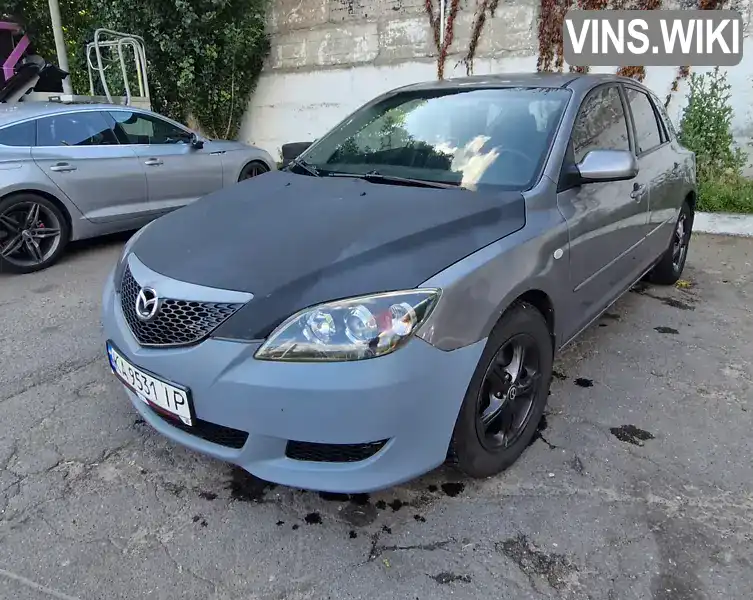 Mazda 3 2004, фото з оголошення 2 з 8, VIN JMZBK14Z241121620