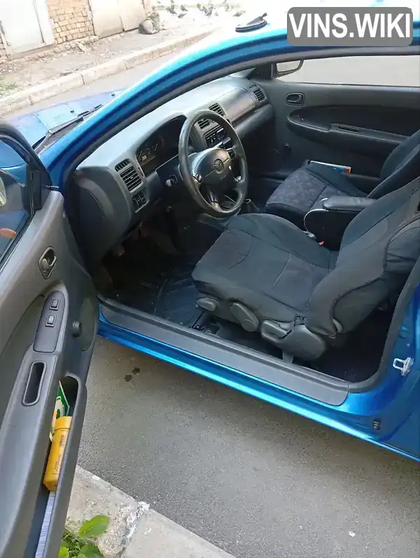 Mazda 323 1998, фото з оголошення 2 з 5, VIN JMZBA153200633738