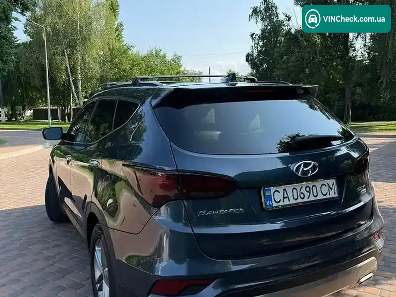 Hyundai Santa FE 2016, фото з оголошення 2 з 13, VIN 5NMZUDLB4HH014074