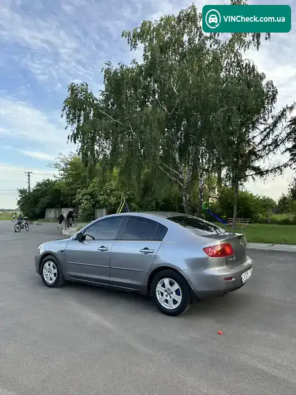 Mazda 3 2004, фото з оголошення 2 з 14, VIN JMZBK12Z251198093