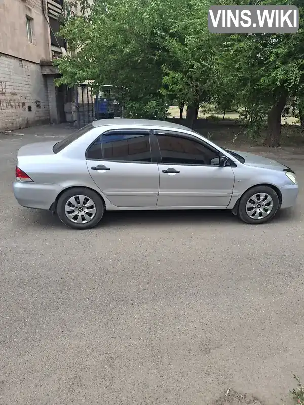 Mitsubishi Lancer 2004, фото з оголошення 2 з 10, VIN JMBSNCS3A5U002421