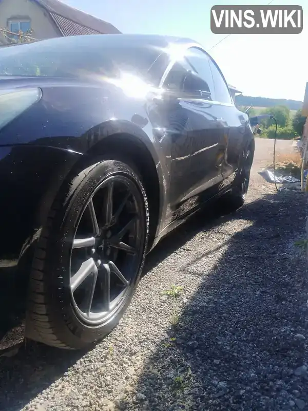 Tesla Model 3 2019, фото з оголошення 2 з 16, VIN 5YJ3E1EB1KF231718