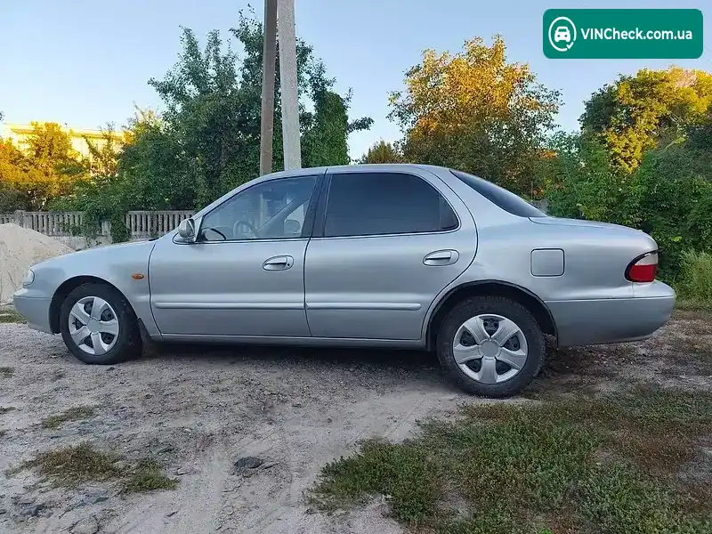 Kia Clarus 1997, фото з оголошення 2 з 13, VIN KNEGC2222W5619524