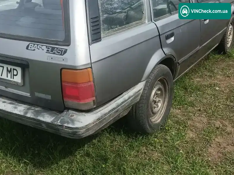 Mazda Familia 1991, фото з оголошення 2 з 11, VIN JM1BF7V00M0302313