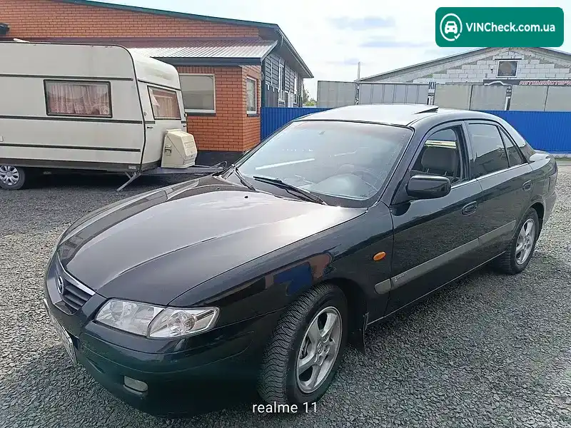 Mazda 626 2003, фото з оголошення 1 з 9, VIN JM7GF10S200217021