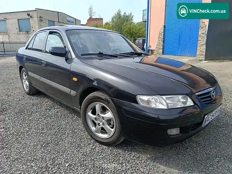Mazda 626 2003, фото з оголошення 2 з 9, VIN JM7GF10S200217021