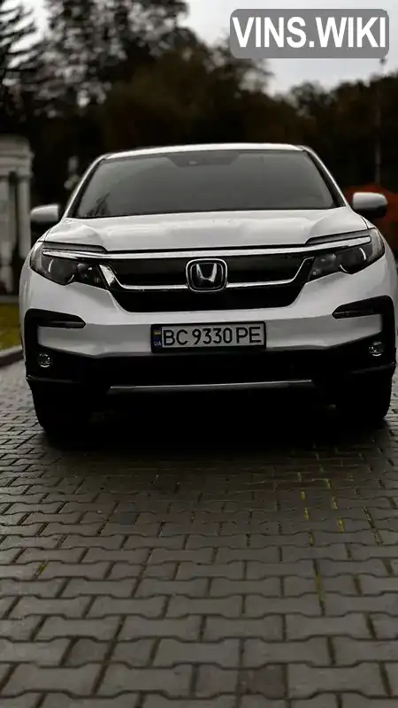 Honda Pilot 2020, фото з оголошення 2 з 21, VIN 5FNYF6H57LB065180