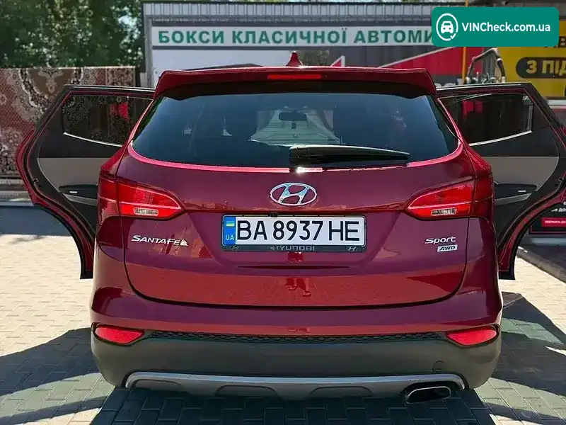 Hyundai Santa FE 2015, фото з оголошення 2 з 9, VIN 5XYZTDLB1GG358201