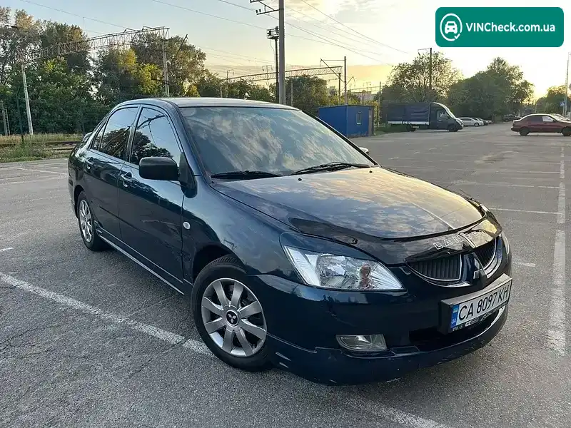 Mitsubishi Lancer 2003, фото з оголошення 2 з 10, VIN JMBSNCS3A4U006234