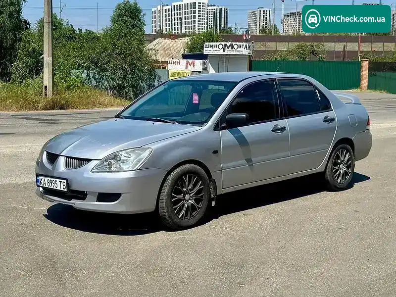 Mitsubishi Lancer 2003, фото з оголошення 1 з 9, VIN JMBSRCS3A4U001337