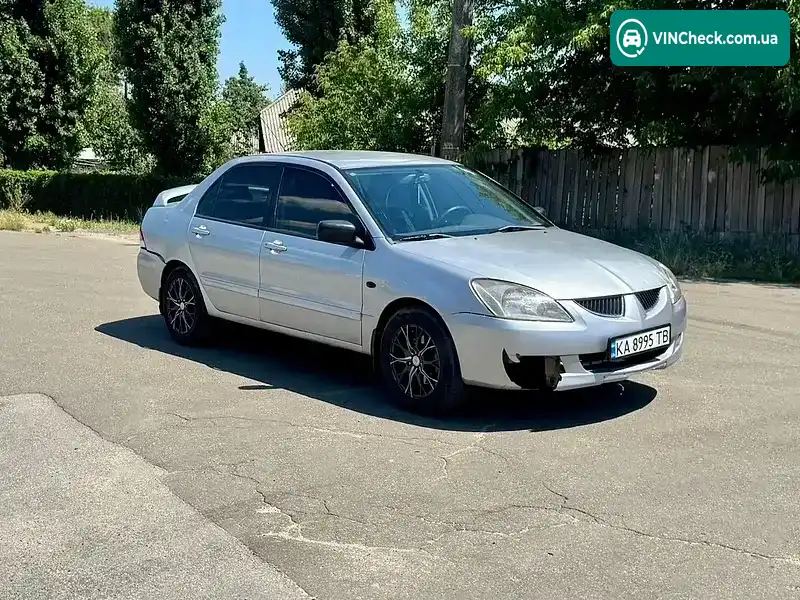 Mitsubishi Lancer 2003, фото з оголошення 2 з 9, VIN JMBSRCS3A4U001337