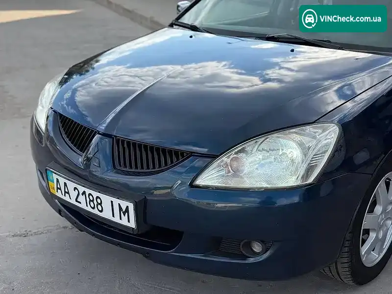 Mitsubishi Lancer 2003, фото з оголошення 2 з 14, VIN JMBSNCS3A4U003558