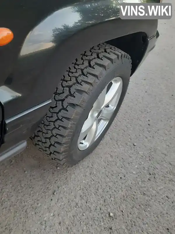 Jeep Grand Cherokee 2003, фото з оголошення 2 з 21, VIN 1J8G2E8AX3Y534916