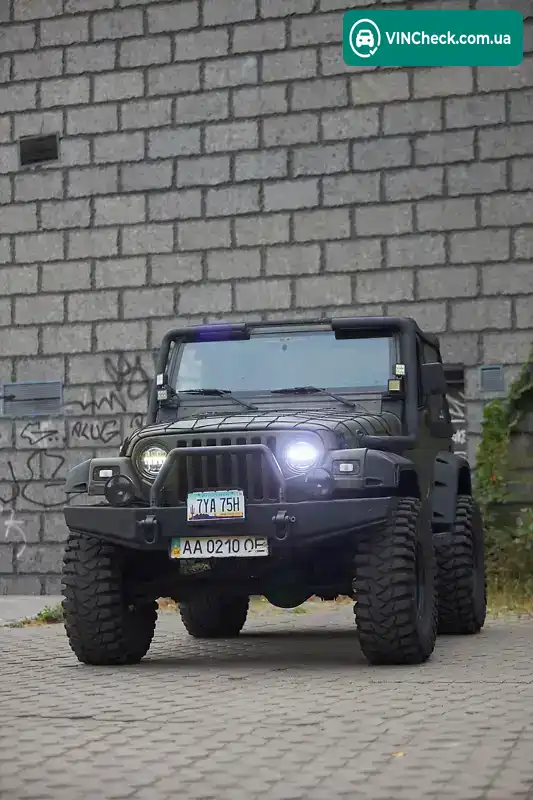 Jeep Wrangler 2000, фото з оголошення 2 з 21, VIN 1J4FAA9S7YP736531