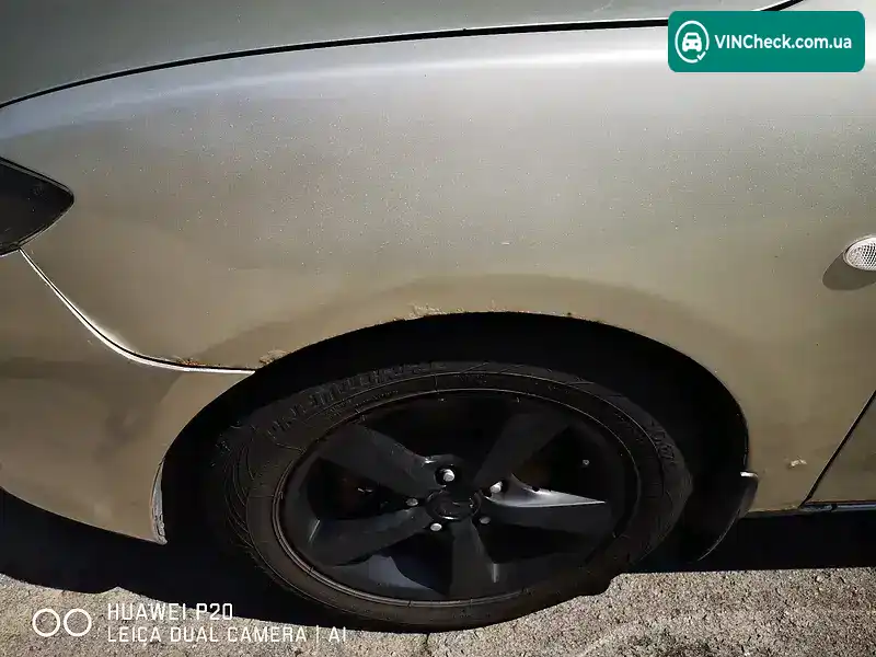 Mazda 3 2004, фото з оголошення 2 з 10, VIN JMZBK12Z551217019
