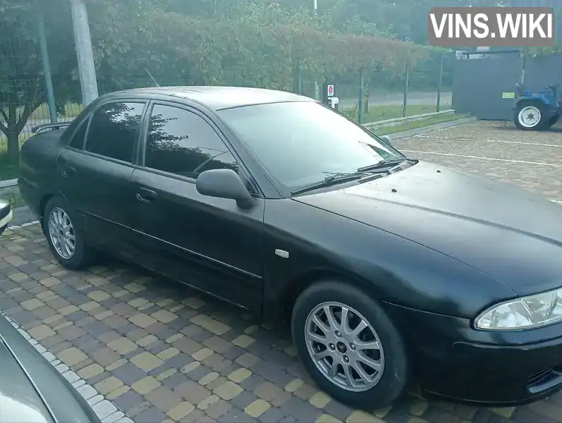 Mitsubishi Carisma 2003, фото з оголошення 1 з 10, VIN XMCSNDA1A3F016863