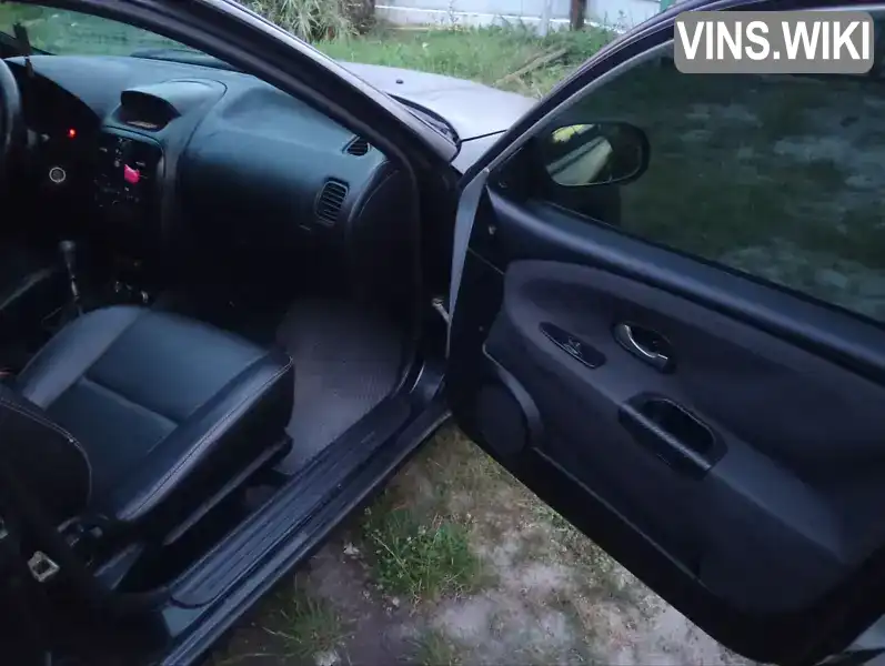Mitsubishi Carisma 2003, фото з оголошення 2 з 10, VIN XMCSNDA1A3F016863