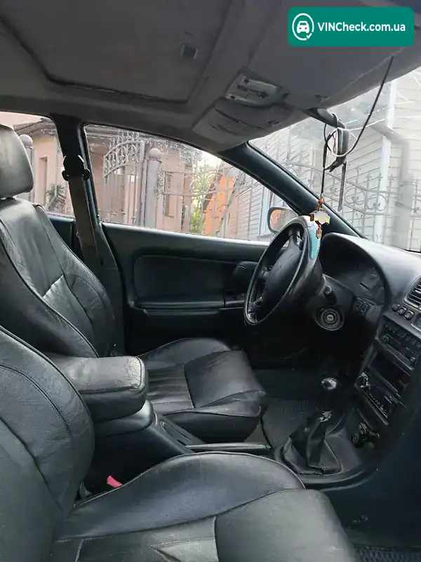 Mazda 323 1997, фото з оголошення 1 з 6, VIN JMZBA145201178863