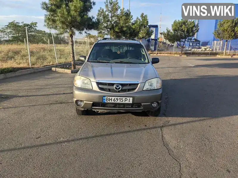 Mazda Tribute 2002, фото з оголошення 1 з 21, VIN 4F2YU08122KM65813