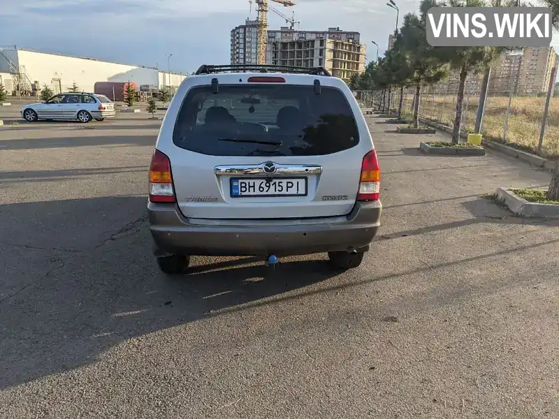 Mazda Tribute 2002, фото з оголошення 2 з 21, VIN 4F2YU08122KM65813