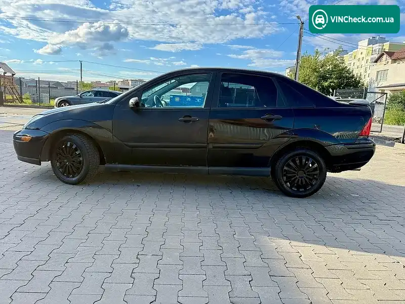 Ford Focus 1998, фото з оголошення 2 з 16, VIN 1FAFP3434YW304202