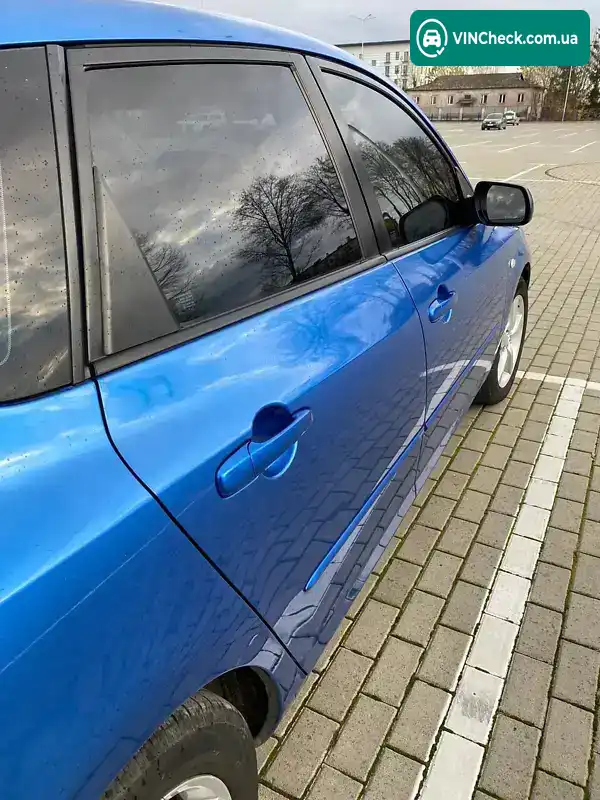 Mazda 3 2004, фото з оголошення 2 з 20, VIN JMZBK14Z251239172