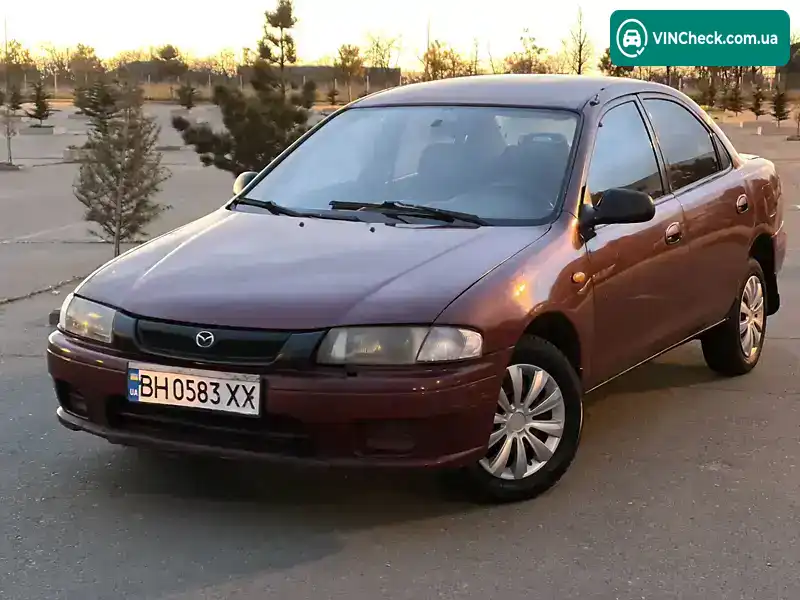 Mazda 323 1997, фото з оголошення 1 з 9, VIN JMZBA125200566197
