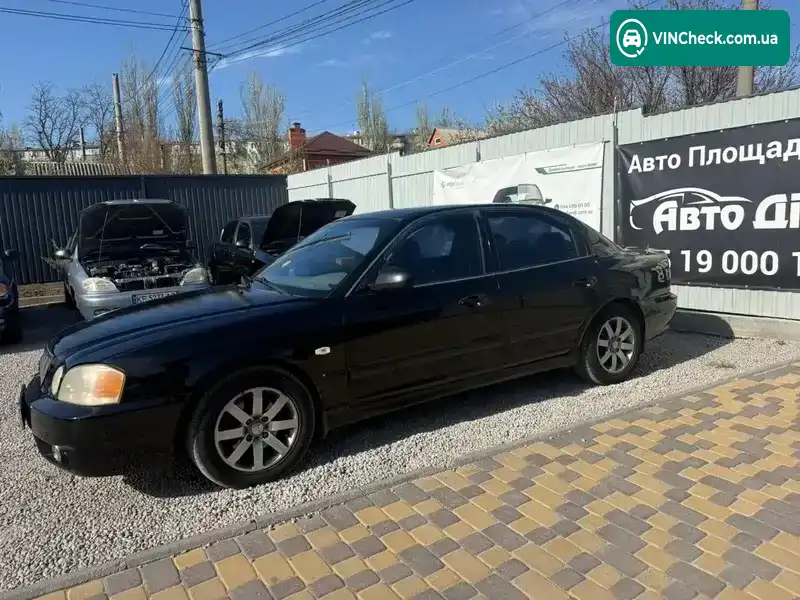 Kia Magentis 2003, фото з оголошення 2 з 12, VIN KNEGD222235201240