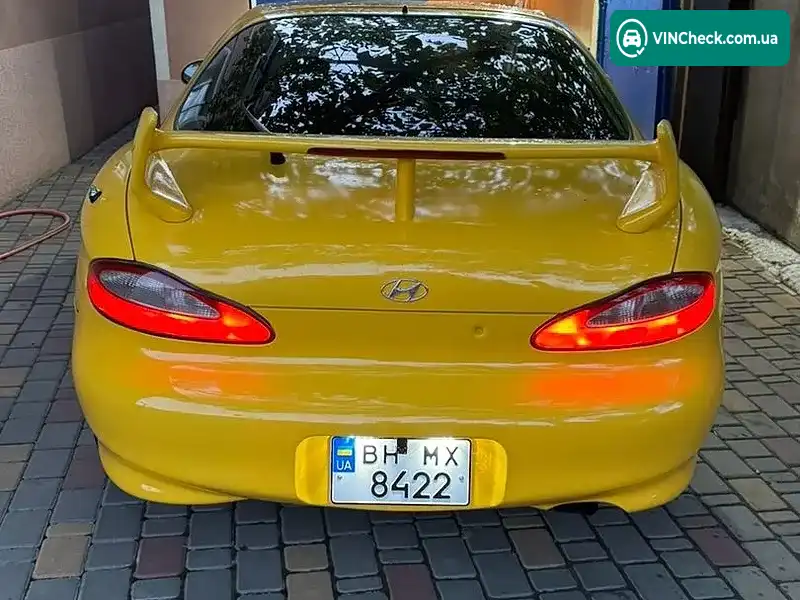 Hyundai Tiburon 1998, фото з оголошення 1 з 9, VIN KMHJG31FPWU113835