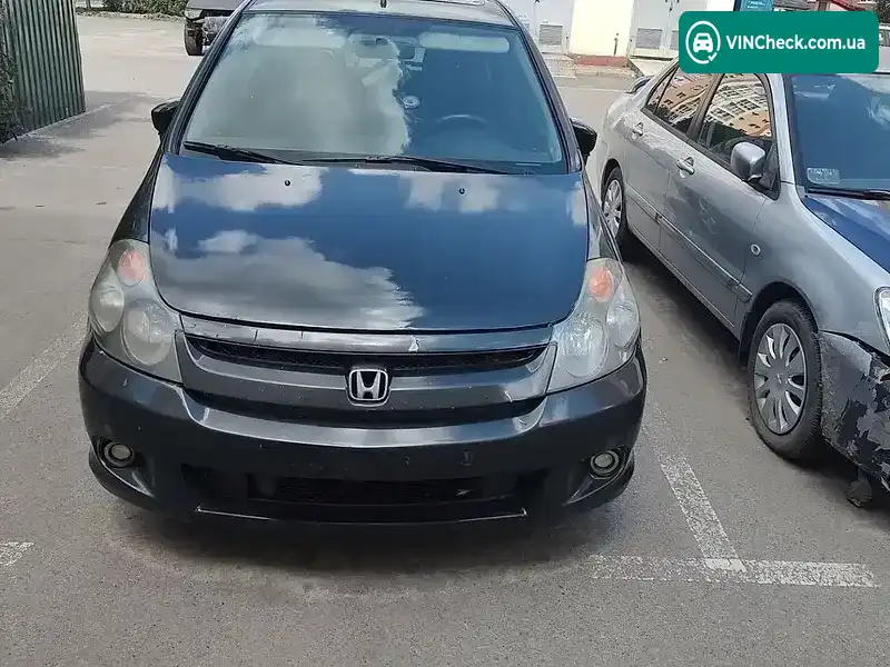 Honda Stream 2004, фото з оголошення 2 з 14, VIN JHMRN37504S203290