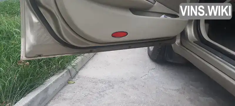 Nissan Primera 2003, фото з оголошення 2 з 8, VIN SJNBAAP12U0100920