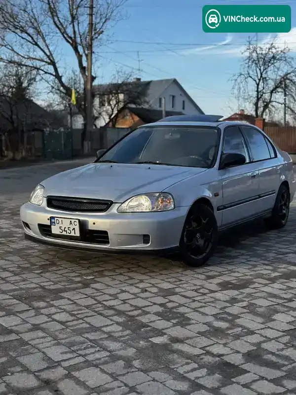 Honda Civic 1999, фото з оголошення 1 з 14, VIN 2HGEJ6612XH523677