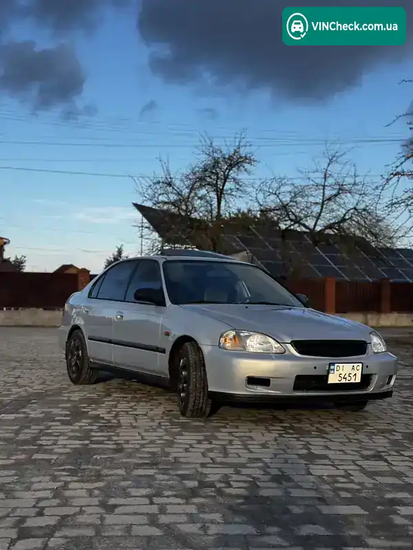 Honda Civic 1999, фото з оголошення 2 з 14, VIN 2HGEJ6612XH523677