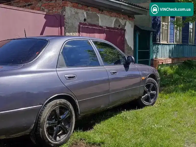 Mazda 626 1995, фото з оголошення 2 з 18, VIN JMZGE12A201177414