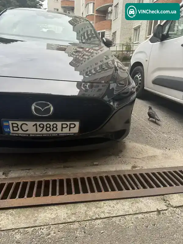 Mazda 3 2019, фото з оголошення 2 з 21, VIN JM1BPBNM0L1156193