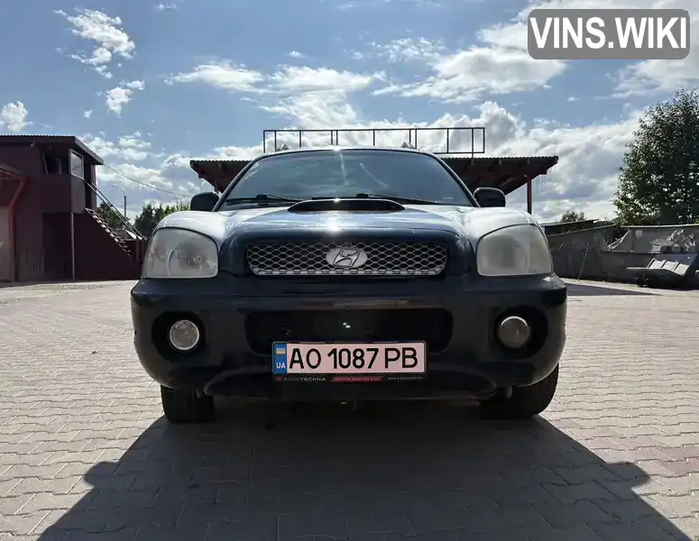 Hyundai Santa FE 2001, фото з оголошення 2 з 17, VIN KMHSC81VP2U173602