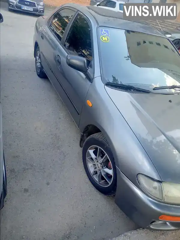 Mazda 323 1995, фото з оголошення 2 з 7, VIN JMZBA125200110214