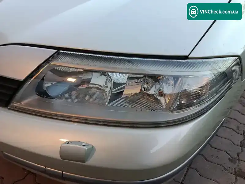 Renault Laguna 2004, фото з оголошення 2 з 12, VIN VF1KG0W0A32179074