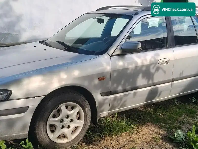Mazda 626 1999, фото з оголошення 1 з 12, VIN JMZGF19S201125163