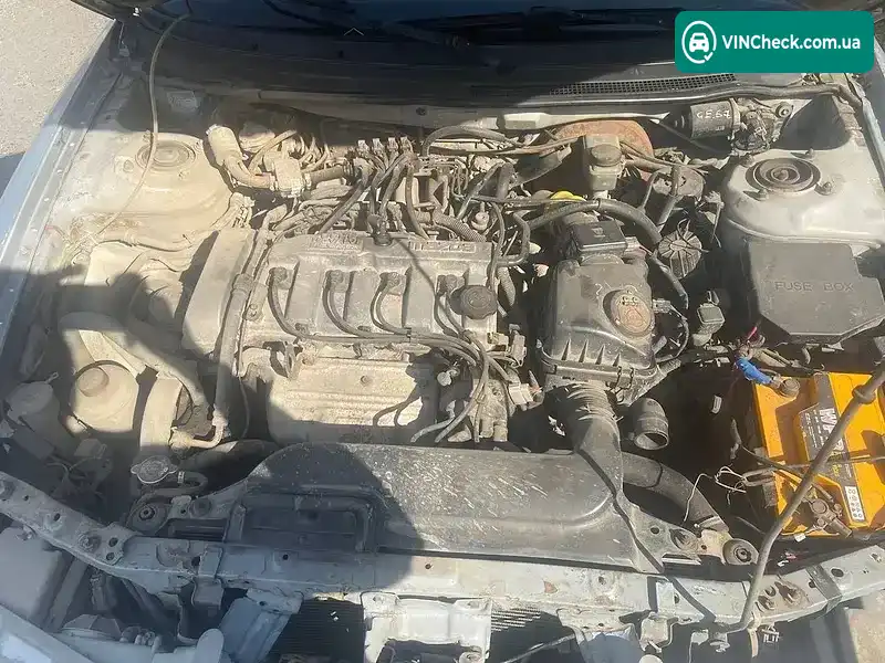 Mazda 626 1996, фото з оголошення 1 з 6, VIN JMZGE12J201489731