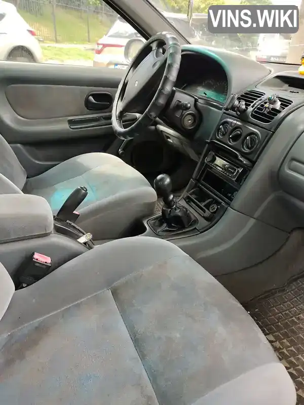 Renault Laguna 1998, фото з оголошення 2 з 9, VIN VF1B560KE17592467