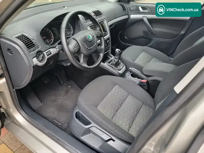 Skoda Octavia 2013, фото з оголошення, VIN TMBHT21Z7D2119127