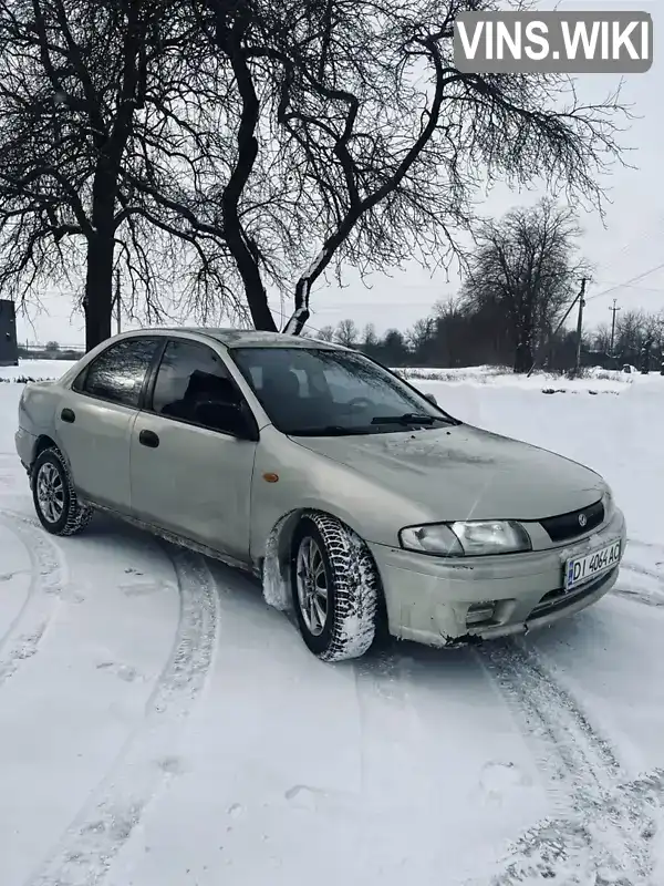 Mazda 323 1997, фото з оголошення 2 з 8, VIN JMZBA125200597177
